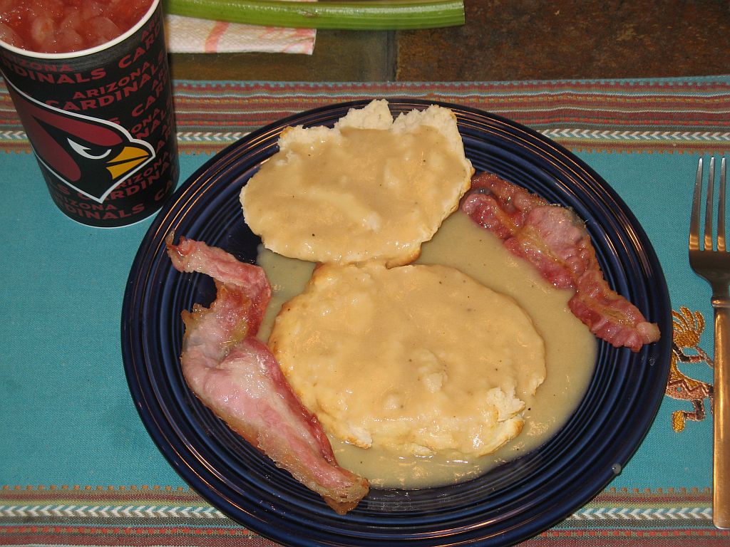 Biscuits ‘n’ gravy with bacon strips