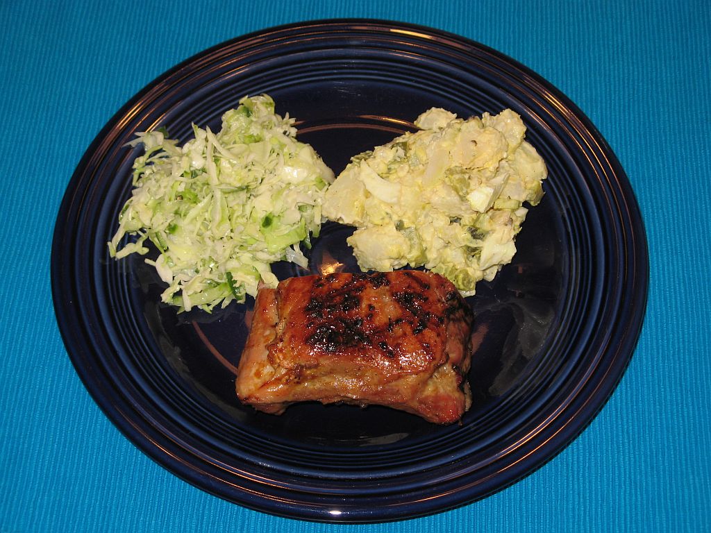 Baby back ribs with potato salad and Cole slaw